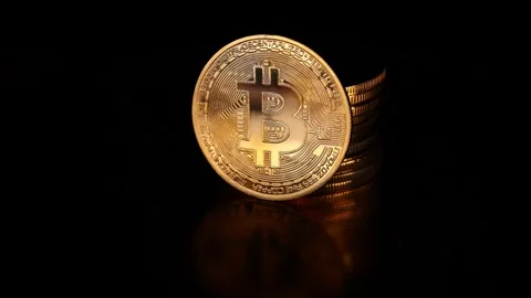 Golden Bitcoin with Stack of Cryptocurrency Coins Stock Footage 339569013