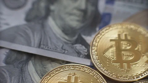 Golden bitcoins on the background of dollars Stock Footage 85024896