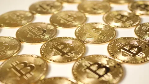 Golden bitcoins, diagonal pattern of real coins. Stock Footage 154511757