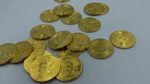 Golden bitcoins fall into disorder Stock Footage 147306832