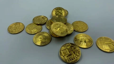 Golden bitcoins fall into disorder Stock Footage 147306852