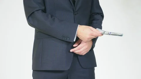 Golden Bitcoins on US dollars in the hands. Electronic money exchange concept Stock Footage 95573248