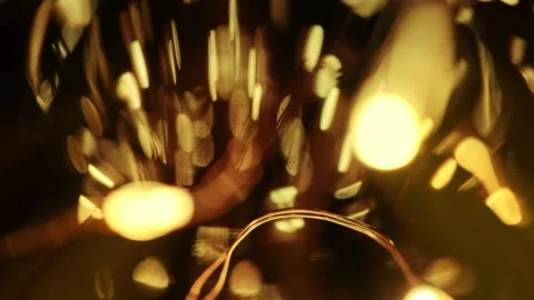 Golden Bokeh and Warm Light Reflections Macro Shot Stock Footage 346755965