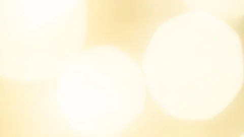 Golden bokeh background with soft, shimmering lights creating a warm ambiance Stock Illustration