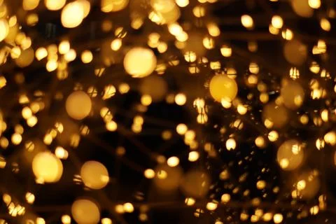 The golden bokeh blurred abstract pattern background. Stock Photos
