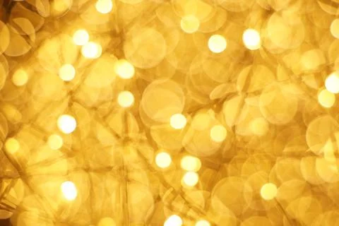 The golden bokeh blurred abstract pattern background. Stock Photos