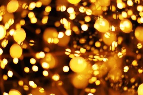 The golden bokeh blurred abstract pattern background. Stock Photos