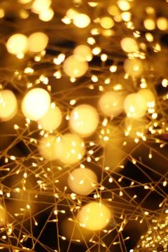 The golden bokeh blurred abstract pattern background. Stock Photos