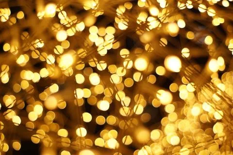 The golden bokeh blurred abstract pattern background. Stock Photos