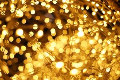 The golden bokeh blurred abstract pattern background. Stock Photos