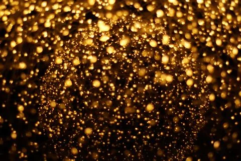 The golden bokeh blurred abstract pattern background. Stock Photos