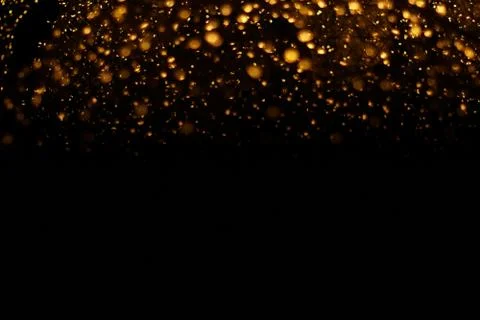 The golden bokeh blurred abstract pattern background. Stock Photos