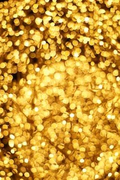 The golden bokeh blurred abstract pattern background. Stock Photos