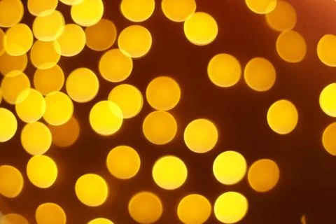The golden bokeh blurred abstract pattern background. Stock Photos