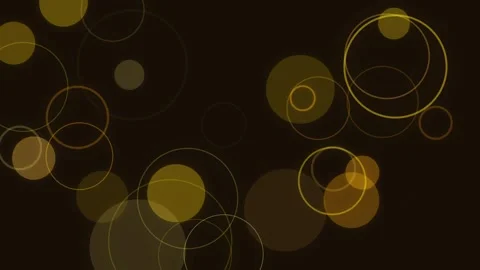 Golden bokeh circles float in dark background during festive celebration fo.. Stock Footage 340939888