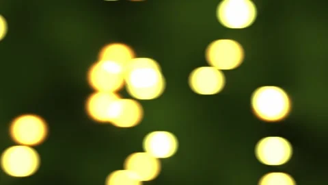 Golden Bokeh Lights on Deep Green Background Abstract Defocused Light Orbs Stock Footage 327925853