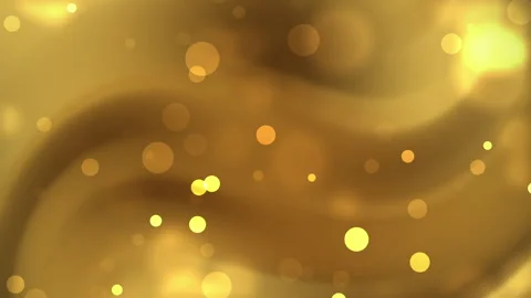 Golden bokeh particles create an ethereal abstract background of soft glowing. Stock Footage 342405974