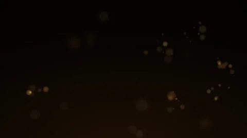 Golden Bokeh Particles on Dark Background Seamless Loop Stock Footage 340573690
