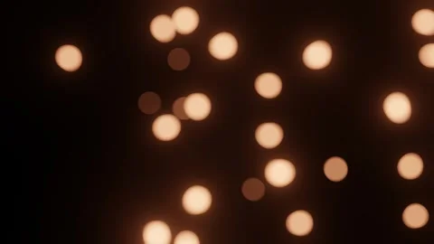Golden bokeh particles falling in the night darkness with aesthetic soft li.. Video stock 330032913