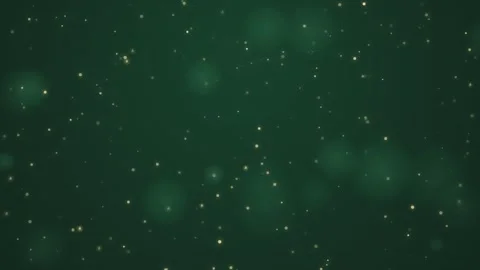 Golden bokeh particles floating slowly over dark green background create el.. Video stock 341133552