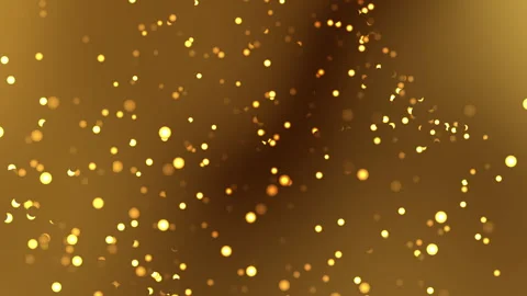 Golden bokeh particles scatter gracefully across a rich dark warm brown. Stock Footage 342405894