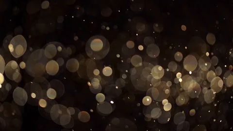 Golden bokeh randomly moving on black background Stock-Footage 120726745