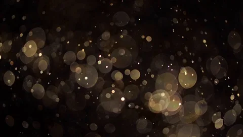 Golden bokeh randomly moving on black background Video stock 120912110