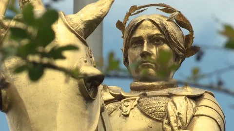 Golden bronze Joan of Arc Maid of Orleans statue Stock Footage