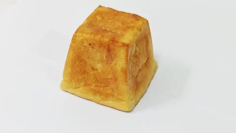 Golden brown cube bread isolated on white background. Stock-Footage 343124901