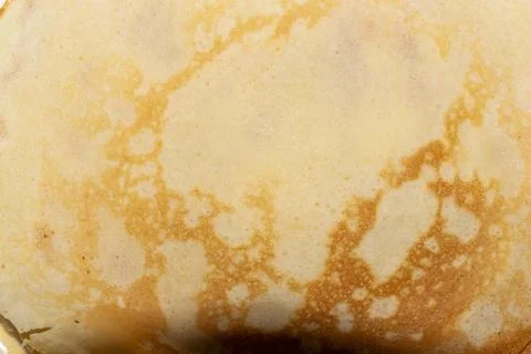 Golden brown pancake surface texture detailed culinary backdrop Stock Photos