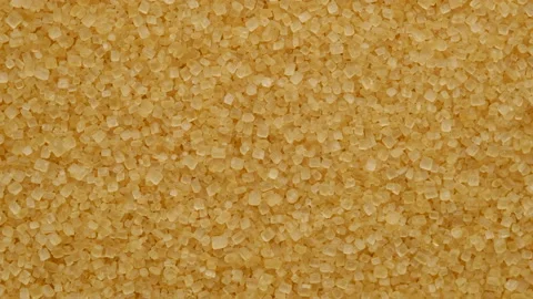Golden brown sugar Demerara. cane sugar background Stock-Footage 130994053