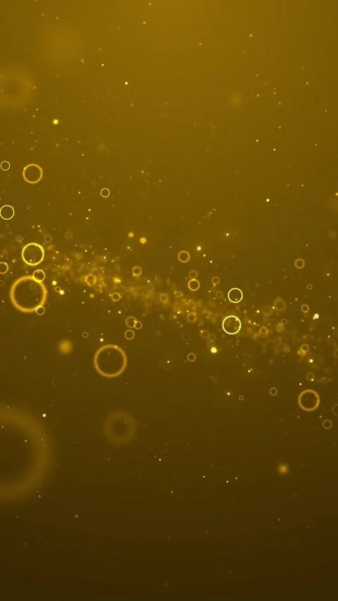 Golden bubble particle glowing circular rings, floating dust, warm amber haze, Stock Footage 340527957