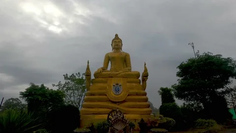 Golden Buddha after rain in the clouds. Stock Footage 232220796