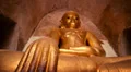 Golden Buddha statue inside Bagan temple HD Footage