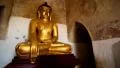 Golden Buddha statue inside Bagan temple HD Footage