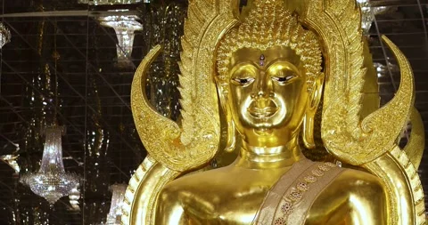 Golden Buddha statue inside a Buddhist temple. Elegant sacred architecture .. Stock Footage 340225259