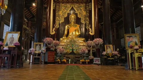 Golden Buddha statue inside Wat Phantao temple Vidéo 338268686