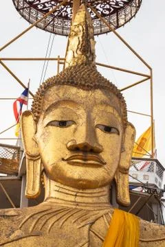 Golden buddha statue in the Wat Intharawihan at Bangkok, Thailand Stock Photos