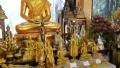 Golden Buddha statues inside Buddhist temple HD Footage