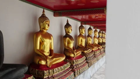 Golden Buddhas Lined up - Buddhist Temple Stock Footage 165927824