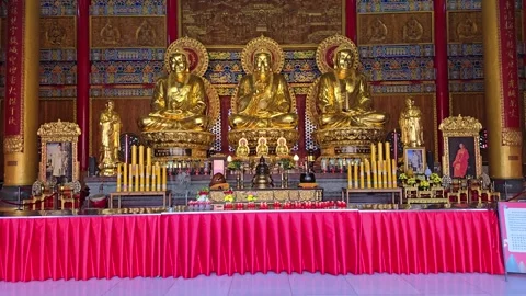 Golden Buddhist Statues Inside Chinese Temple for Prayer in Thailand Stock Footage 333143986