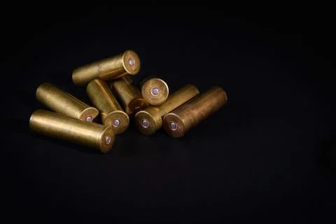 Golden bullets on a black background Stock Photos