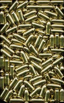 Golden bullets texture background Stock Photos