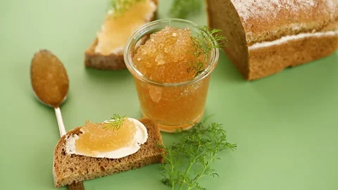 Golden caviar served on bread with butter in elegant food composition Stock Footage 323316994