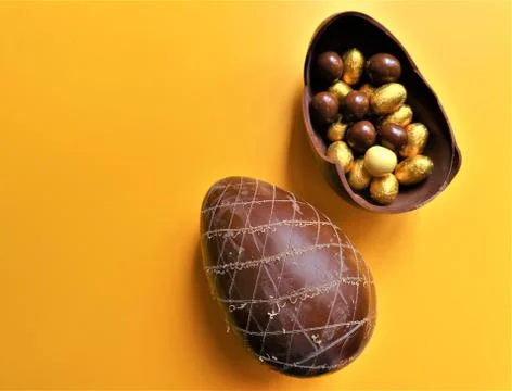 Golden chocolate Easter eggs  with copy space Stock Photos