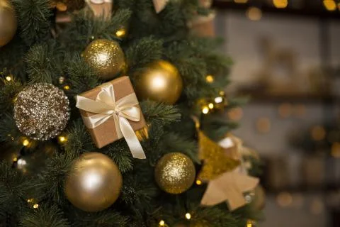 Golden christmas tree decorations, place for text Stock Photos