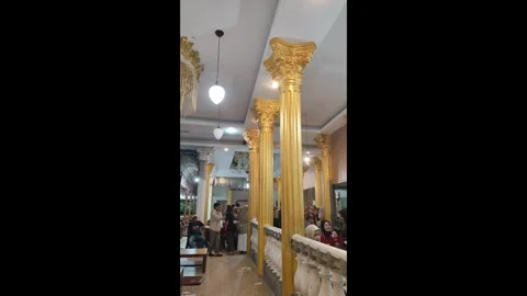 Golden Classic Columns Interior Design with People Gathering Indoors Stock Footage 319026519