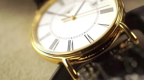 Golden classical wrist watch macro shot. Slow motion video Stock Footage 57910738