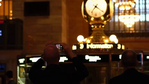 Golden Clock on top of information booth in Grand Central  Terminal Stock Footage 117814815