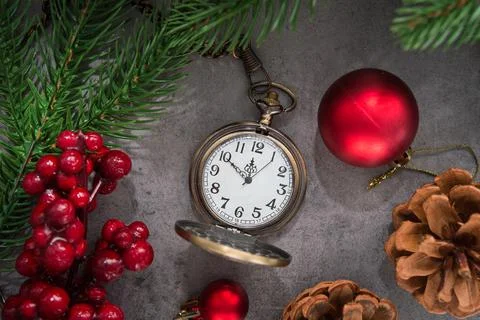 The golden clock, whose arrow are about twelve o'clock New Year celebration Stock Photos